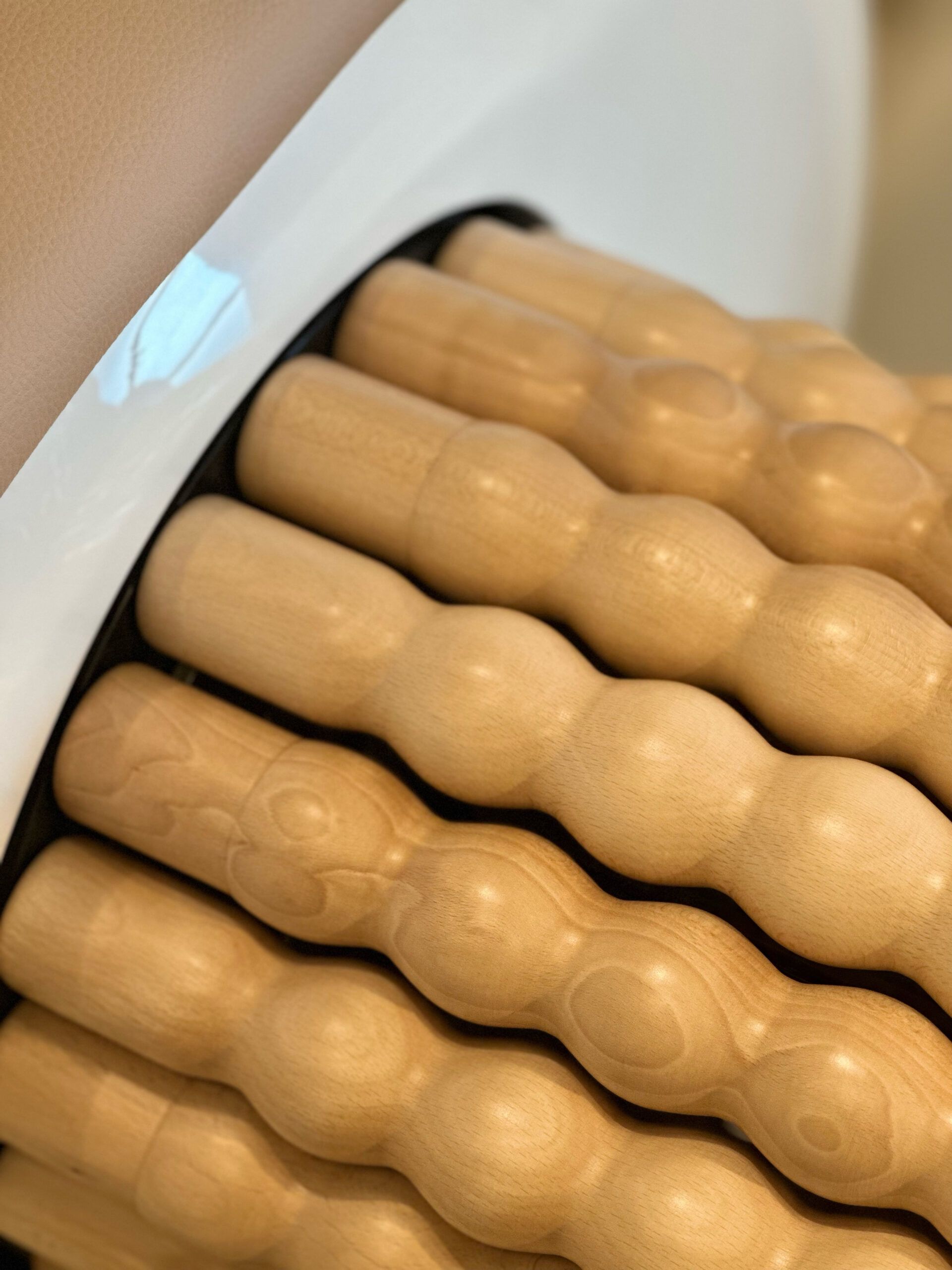 De houten bamboerollers van de Bodyroll